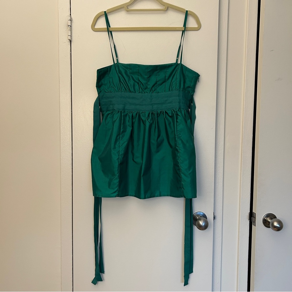BCBGirls Sleeveless Peplum Top with Ribbon Ties in Emerald Green (Size Large)